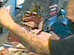 Supporting image for story: Rowley Regis knife raid suspect sought by tattoo on arm