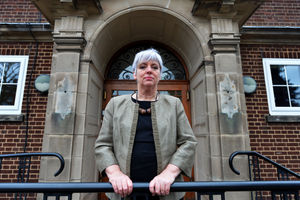 Headteacher Tina Blankley outside the main entrance where the lanterns were stolen