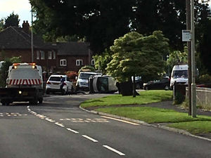 Supporting image for story: Pictures: Women hurt as car on its side in two-vehicle Telford crash