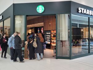 Supporting image for story: Coffee fans queue up for opening of new Starbucks shop in Telford Centre - just in time for Halloween