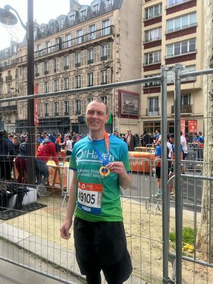 With his medal at the end of the race