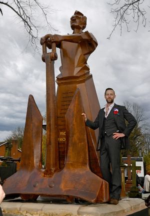 Luke Perry with the sculpture. Photo: Tim Thursfield