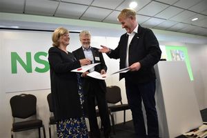 Julie Otter accepting her Honorary Council Member Award from the NSPCC's CEO Chris Sherwood.