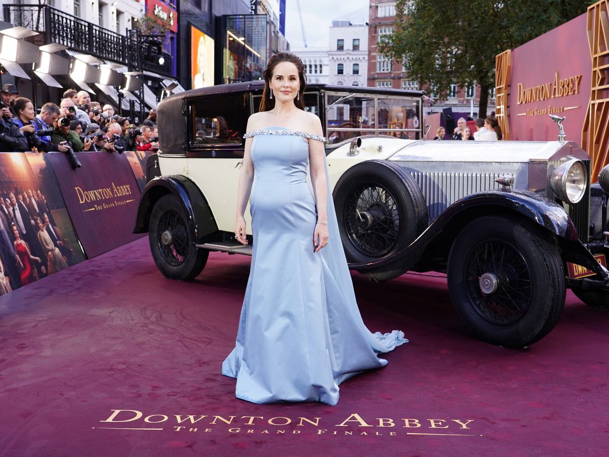 Michelle Dockery reveals she is pregnant with first child at Downton premiere