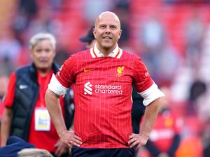 Liverpool head coach Arne Slot celebrates the title win