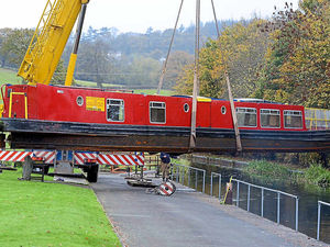 Supporting image for story: Pictures and video: Narrowboat takes a trip on to dry land