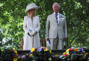 The Prince of Wales and the Duchess of Cornwall during the national service of remembrance marking the 75th anniversary of VJ Day at the National Memorial Arboretum in Alrewas, Staffordshire. Photo: Molly Darlington/PA Wire.