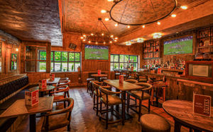 The restaurant includes large screen TVs showing UK and American sports.