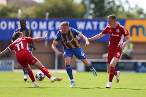 Taylor Moore of Shrewsbury Town and Ethan Hamilton of Accrington Stanley (AMA)