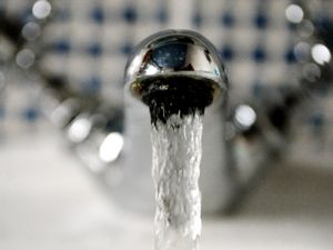 Water pouring from a tap