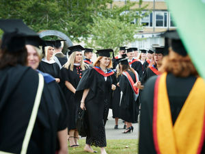 Supporting image for story: Students take part in college graduation ceremony