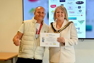 Earl Edwards completed the most laps with 161 and received his certificate from the Mayor