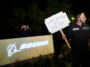 Supporting image for story: Boeing factory workers go on strike after rejecting contract offer