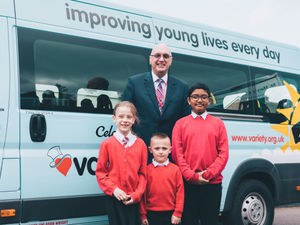 Supporting image for story: School gifted new minibus by children's charity