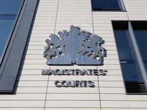 A sign for a magistrates' court