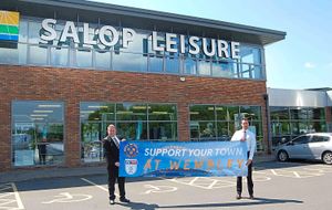 Mike and Ed with a banner at Salop Leisure