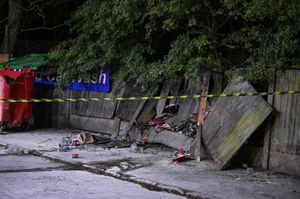 The wall nearby shows the damage done when the Jeep hit it. Photo: SnapperSK