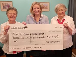Supporting image for story: Shrewsbury ladies choir donate to local branch of Parkinson's UK