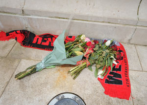Flowers left in tribute to at the statue of Duncan Edwards