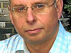 Supporting image for story: Grass is 'out of control' in village