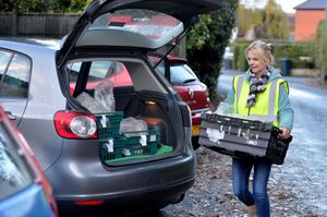 Liz Evans loading up the car with food hub deliveries 