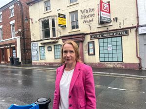 Helen Morgan MP outside the building 