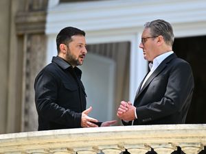 Prime Minister Sir Keir Starmer and President of Ukraine Volodymyr Zelensky talk during a meeting in Rome