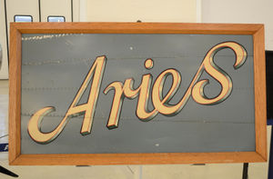 The only surviving part of the original Aries is this panel bearing the name.
