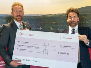 Councillor Ian Preece (right) presented a cheque to Severn Hospice's community fundraiser Phil Haigh on Thursday, May 15. Picture: Telford & Wrekin Council.