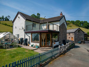 Supporting image for story: Country retreat with 42 acres and converted barns goes up for sale in Powys