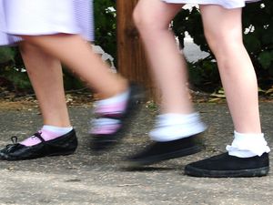 Girls walking to school