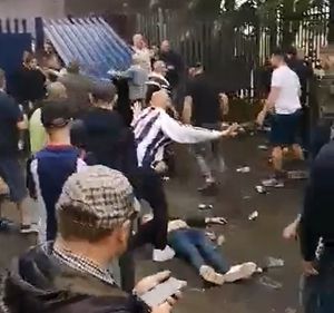 One man was lying motionless on the ground during the brawl. Photo: Twitter