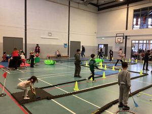 Young people enjoying the crazy golf course set up at the Way Wonderland free event