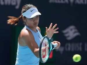 Emma Raducanu hits a forehand at the Miami Open