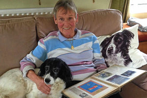 Looking through photos of past adventures is daredevil fundraiser Julia Prior