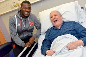  Amadou Bakayoko saying hello to big Walsall FC fan Gordon Morris