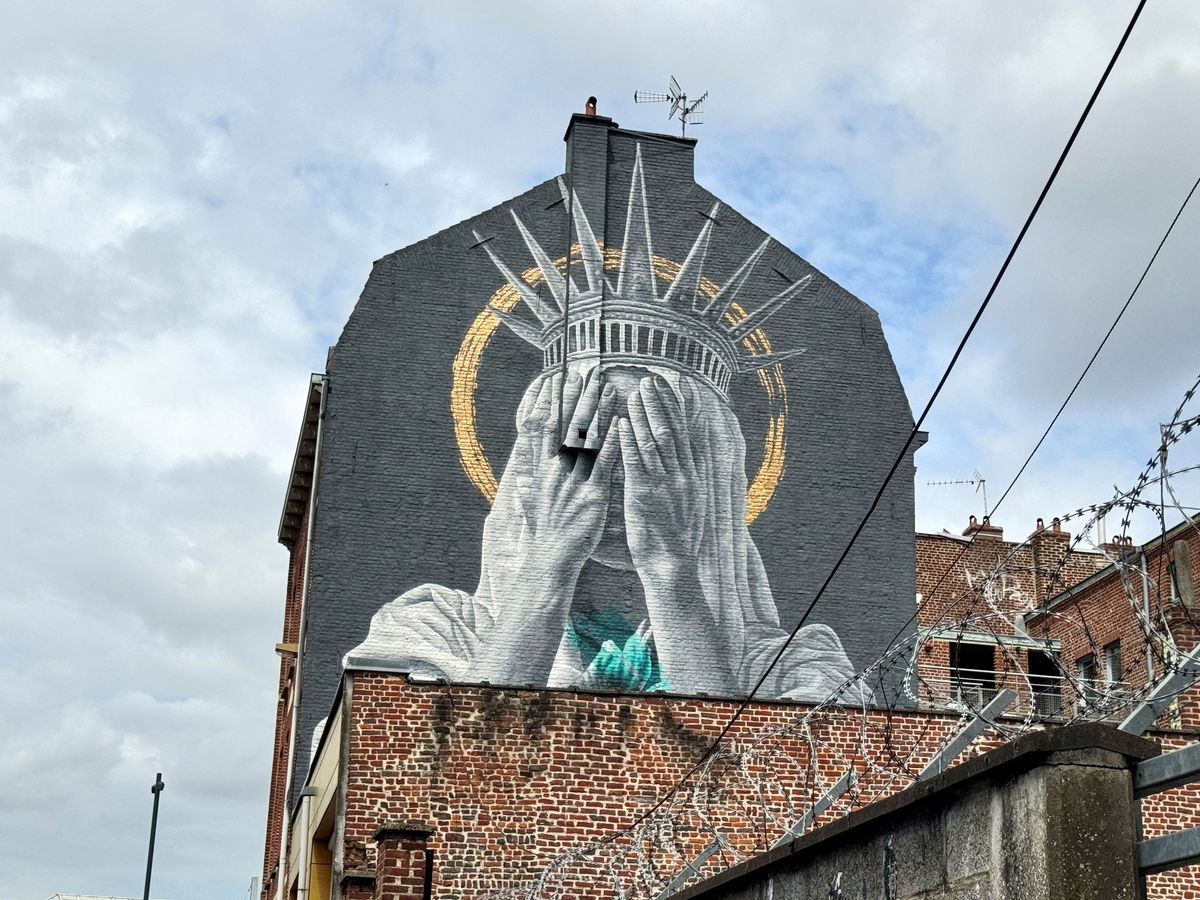 French mural shows Statue of Liberty covering her eyes in swipe at Trump