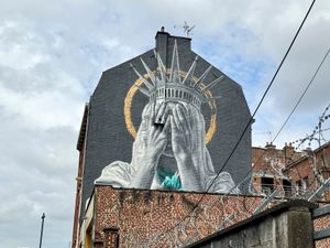 Supporting image for story: French mural shows Statue of Liberty covering her eyes in swipe at Trump