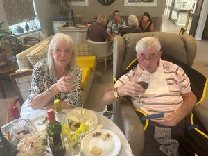 Residents and family members at HC-One’s Perry Locks Care Home celebrating cheese and wine day