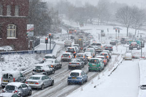 Cars struggle through the snow in Wolverhampton