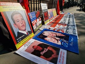 Posters placed outside Arundel House in London, where the Lampard Inquiry is taking place