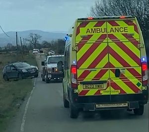 An ambulance on blue lights struggled to get through Cleeton Lane. Picture: Keith Bowen