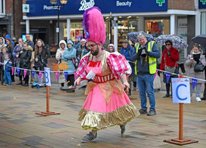 Stafford pancake race Market square. Pictured, Mike Groves