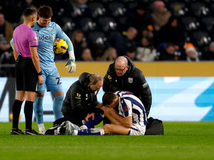 Supporting image for story: West Brom concern for defender Krystian Bielik after ankle setback in defeat