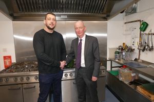 Tom Hayden of the Good Shepherd Ministry shows MP Pat McFadden MP around kitchen of the charity's base