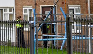 Police and scene of crime officers at Lilleshall Crescent, Wolverhampton, after a murder inquiry is launched after man is shot dead.