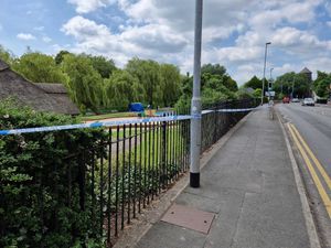 The park remains cordoned off with a tent still in place near the children's playground in Victoria Park