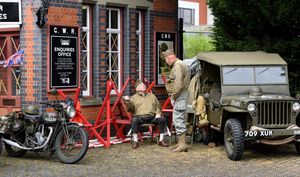 The event featured plenty of wartime vehicles, including this vintage car and motorcycle. 