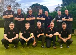 A team picture on the green