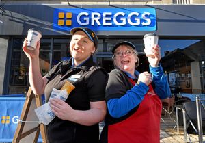 Staff members Rosie Edwards and Teresa Lavill celebrate with a coffee and a sausage roll. Photo: Tim Thursfield